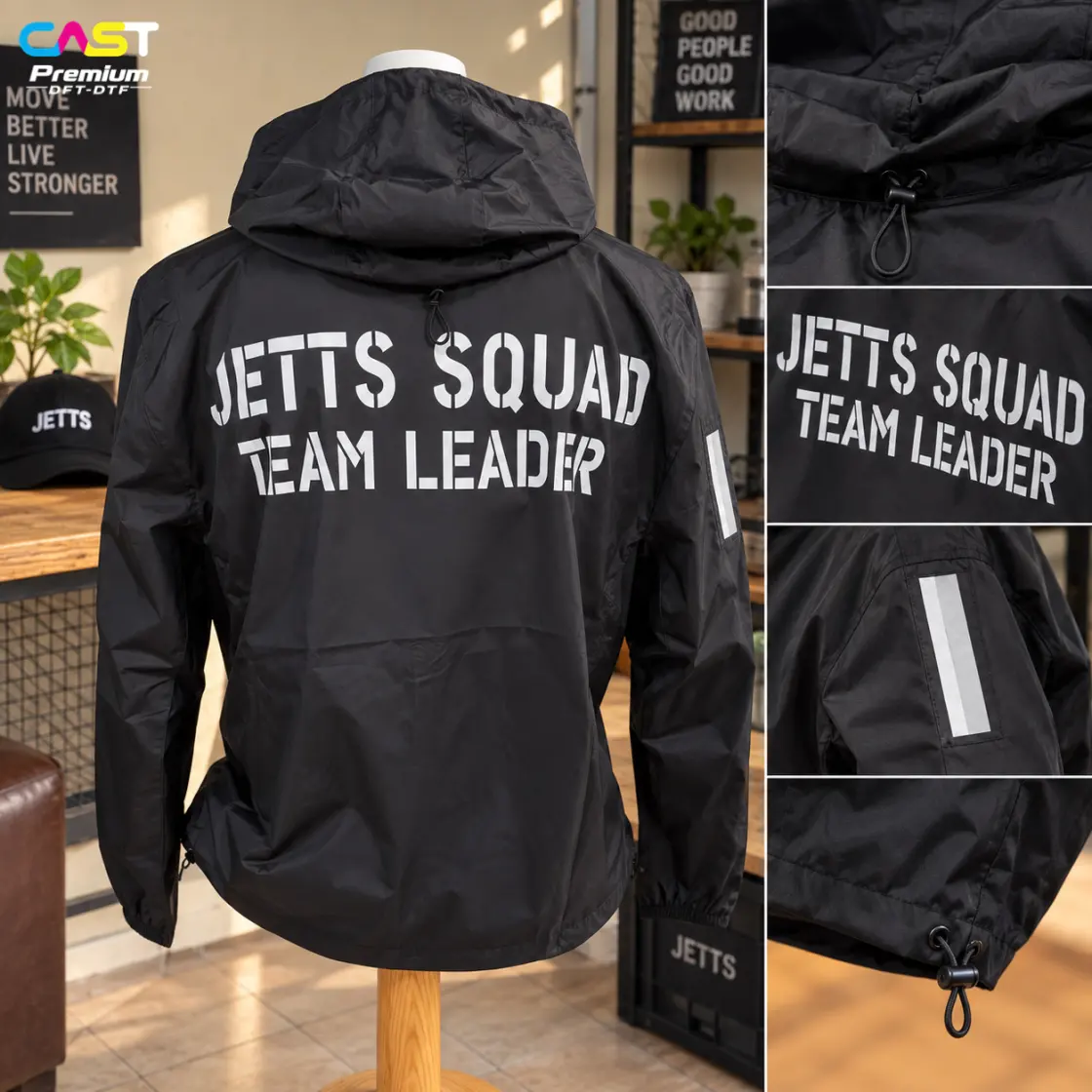 เสื้อกันลมมีฮู้ดสีดำสกรีนข้อความ Jetts Squad Team Leader พร้อมแถบสะท้อนแสง